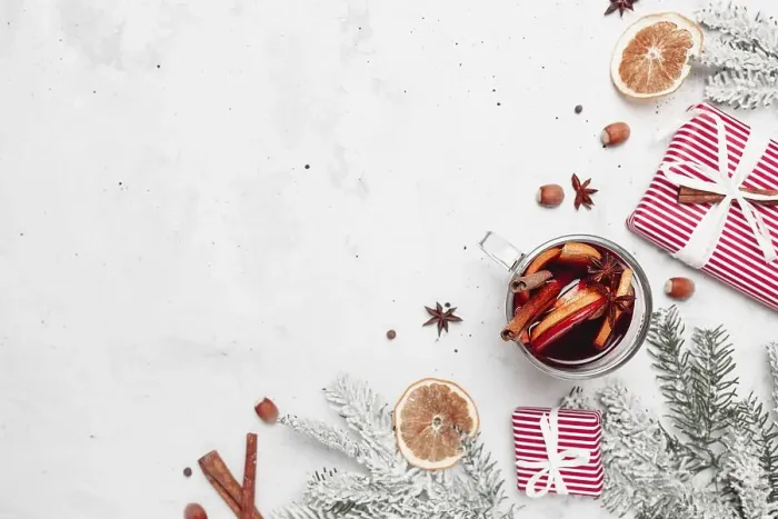 Framed Print : Christmas flat lay top view on white gray concrete background table with glass cup or mug of Mulled Wine Framed Print : Christmas flat lay top view on white gray concrete background table with glass cup or mug of Mulled Wine