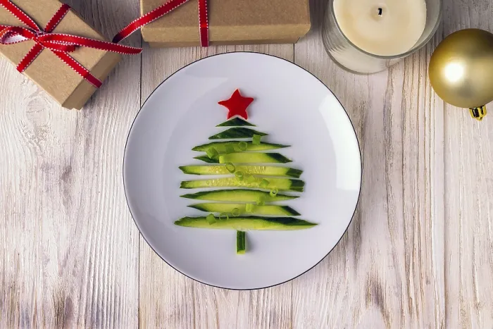 Framed Print : Christmas tree is made of cucumber pieces and lies on a plate