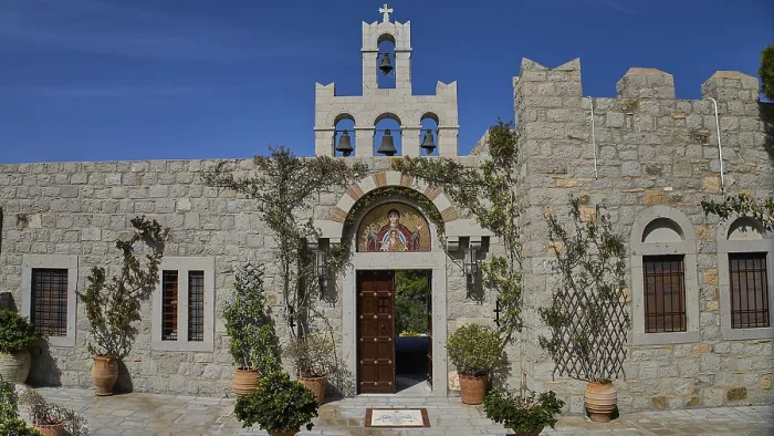 Framed Print : Church facade with bell tower and religious icon