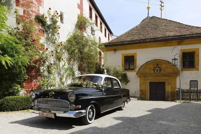 Framed Print : Church on the right and forecourt with vintage Opel Kapitaen, built 1955-1958, Egloffstein Castle, built around 1150, hilltop castle, Spornburg, former high medieval noble castle, Egloffstein market, Trubach Valley