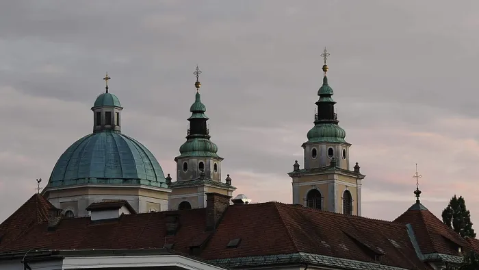 Framed Print : Three church towers and a dome rise against a cloudy evening sky Framed Print : Three church towers and a dome rise against a cloudy evening sky