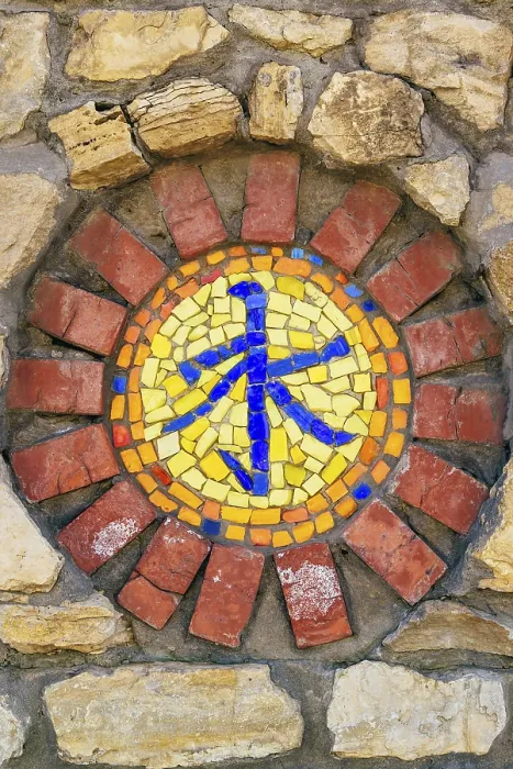 Framed Print : Circular mosaic religious symbol of confucianism on stone wall