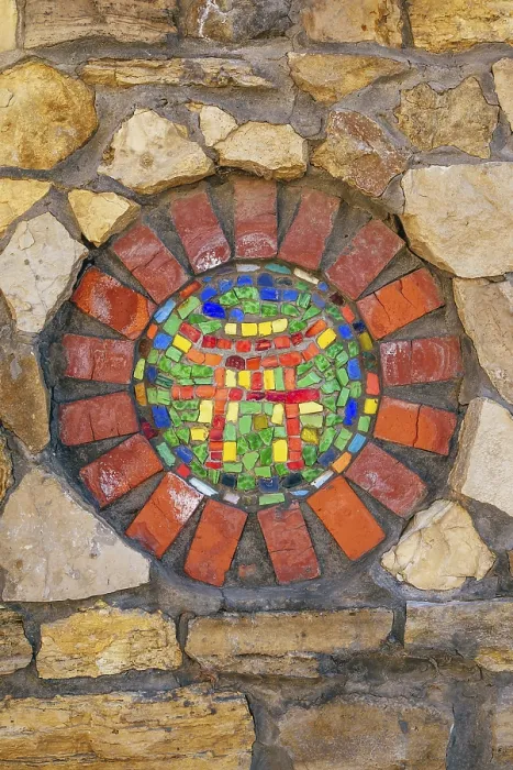 Framed Print : Circular mosaic religious symbol of Shinto on stone wall