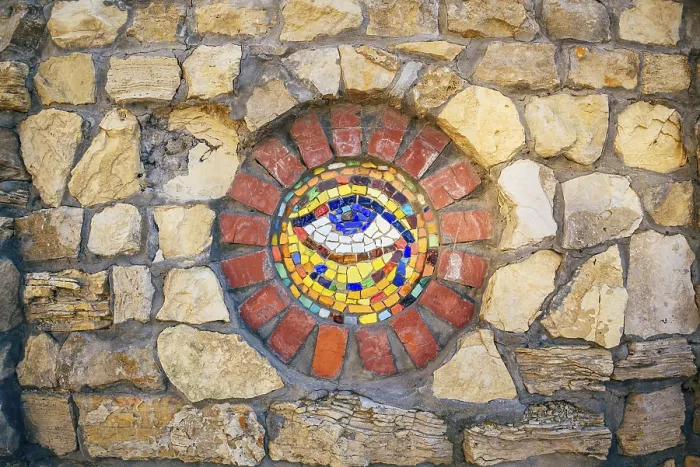 Framed Print : Circular mosaic symbol Eye of Horus on stone wall