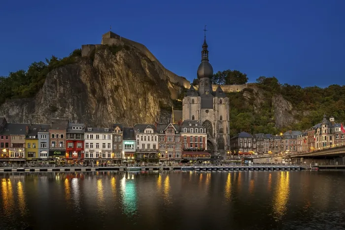 Framed Print : Citadel and 13th-century Collegiate Church of Notre Dame de Dinant in the city along the river Meuse at dusk Framed Print : Citadel and 13th-century Collegiate Church of Notre Dame de Dinant in the city along the river Meuse at dusk