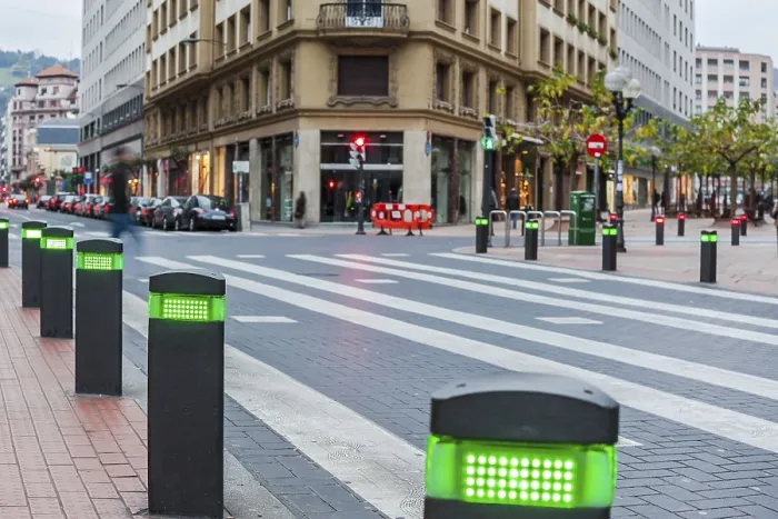 Framed Print : City centre in Bilbao, Spain with modern traffic lights posts on pedestrian crossing Framed Print : City centre in Bilbao, Spain with modern traffic lights posts on pedestrian crossing