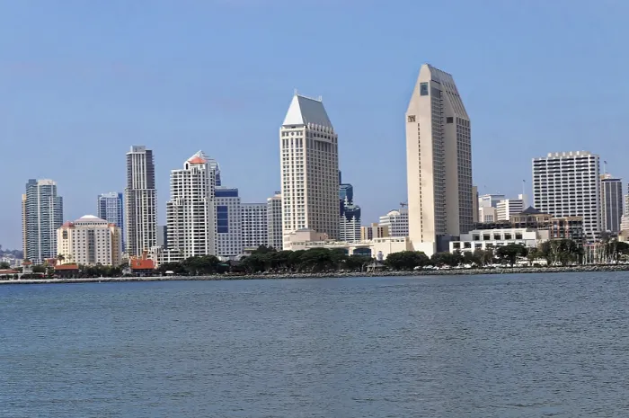 Framed Print : City skyline with modern buildings and water in the foreground Framed Print : City skyline with modern buildings and water in the foreground