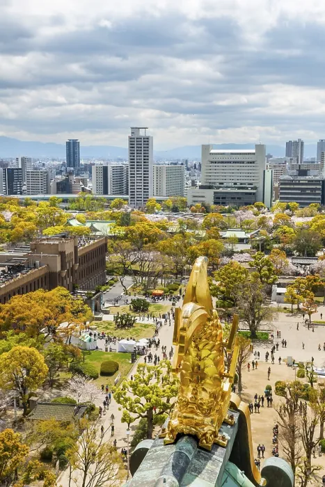 Framed Print : City view with skyscrapers and Osaka Castle Park with cherry blossoms