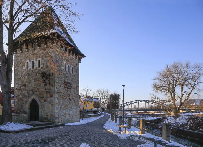 Framed Print : City wall with tower, Hindenburg bridge over the Weser Framed Print : City wall with tower, Hindenburg bridge over the Weser