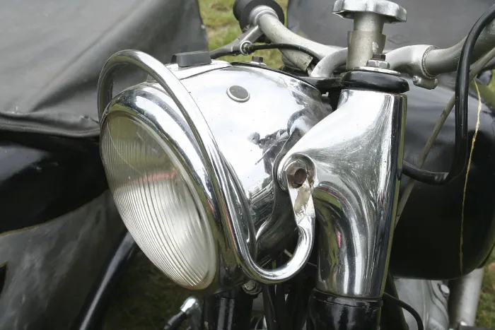 Framed Print : Classic car headlight of a motorbike with sidecar