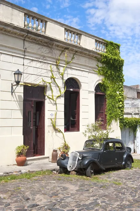 Framed Print : Classic car, out of use, in front of a house