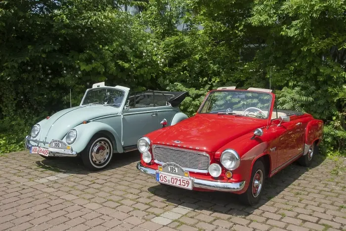 Framed Print : Two classic convertibles, one red and one light blue Framed Print : Two classic convertibles, one red and one light blue