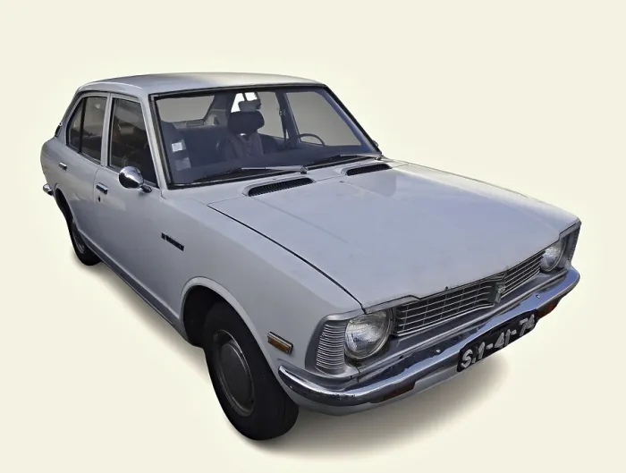 Framed Print : Classic white Toyota Corolla car parked on a seamless white background