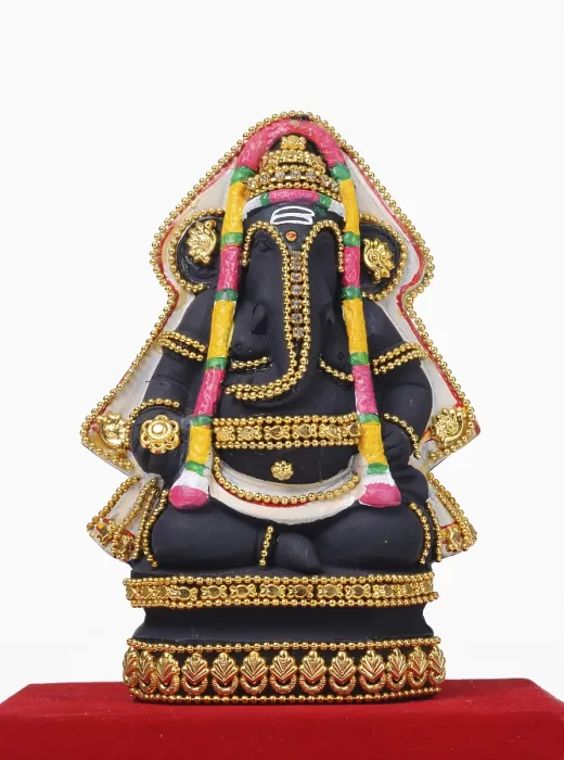 Framed Print : Clay statue of lord ganesh on red cloth