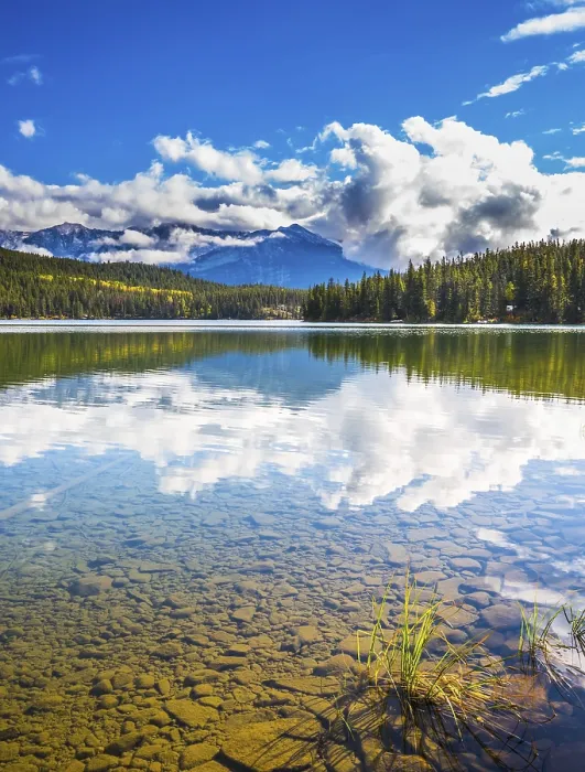 Framed Print : Clear water Pyramid Lake reflects the clouds and pine forests on shore Framed Print : Clear water Pyramid Lake reflects the clouds and pine forests on shore