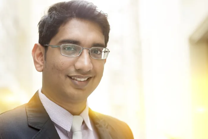 Framed Print : Close up portrait of handsome Asian Indian business man smiling Framed Print : Close up portrait of handsome Asian Indian business man smiling