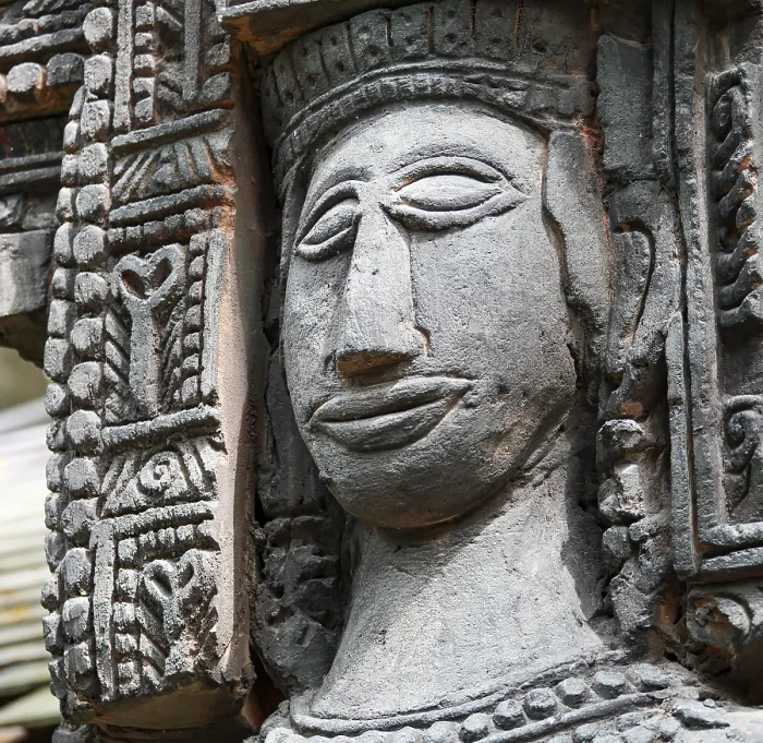 Framed Print : Close up shot of stone statue of a woman with a smiling face