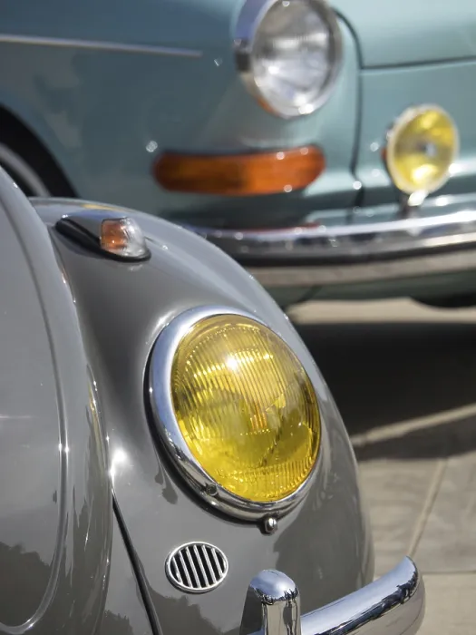 Framed Print : Close-up of a grey vintage car with yellow headlights