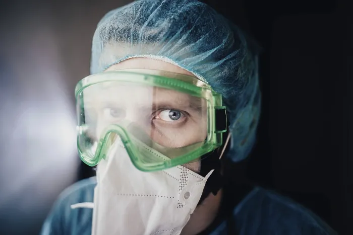 Framed Print : Close-up of a medical worker in protective gear