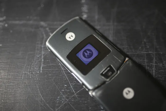 Framed Print : Close-up of a Motorola flip phone with its external display Framed Print : Close-up of a Motorola flip phone with its external display