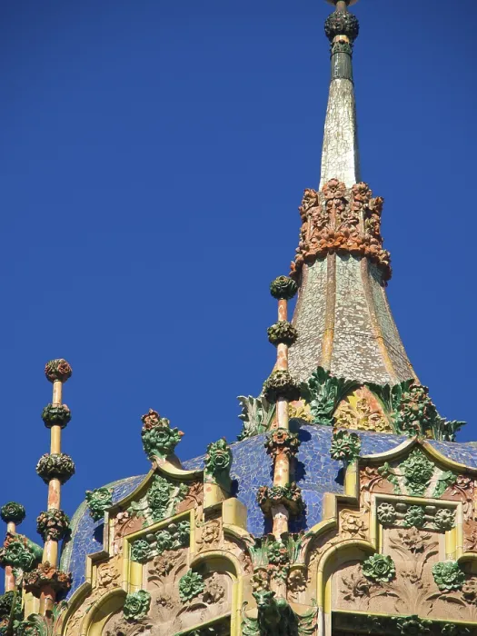 Framed Print : Close-up of an ornate tower with blue ornamentation and decorative elements Framed Print : Close-up of an ornate tower with blue ornamentation and decorative elements