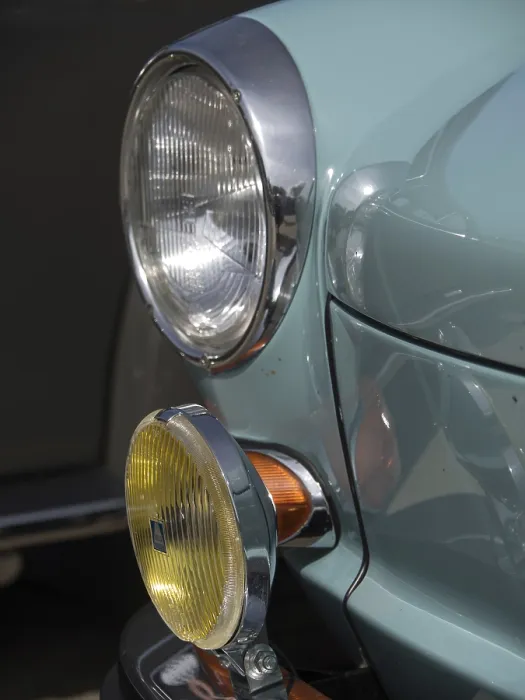 Framed Print : Close-up of a turquoise classic car with additional yellow headlights and chrome accents Framed Print : Close-up of a turquoise classic car with additional yellow headlights and chrome accents