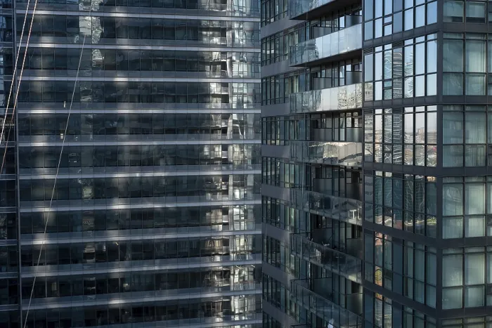 Framed Print : Close-up of urban high-rise with reflective glass Framed Print : Close-up of urban high-rise with reflective glass