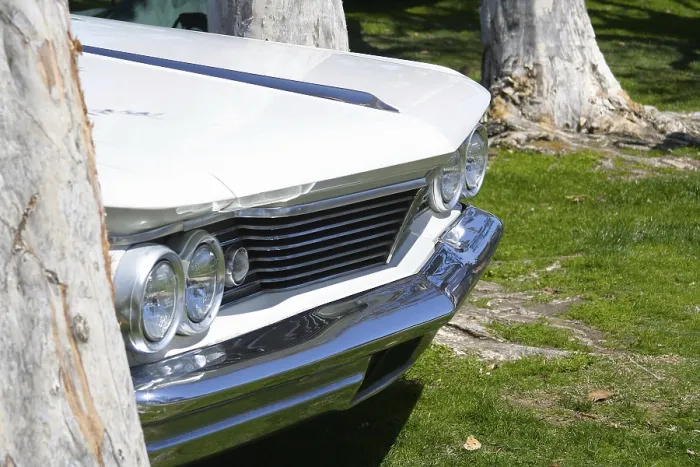 Framed Print : Close-up of a white vintage car