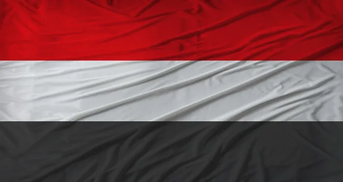 Framed Print : Close up of Yemen flag waving. Flag of Yemen with cloth texture