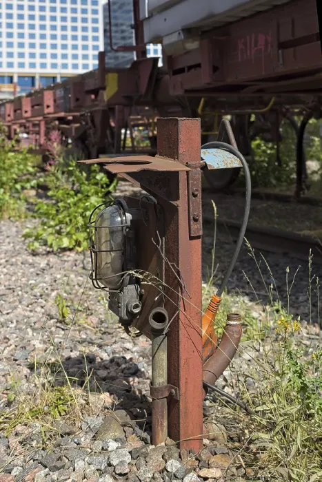 Framed Print : Closeup of old lamp and electrical junction box at railway freight station