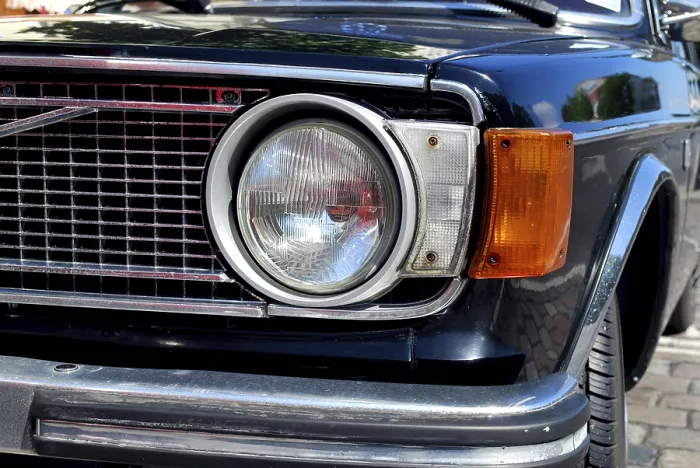 Framed Print : Closeup of oldtimer headlight of a volvo car