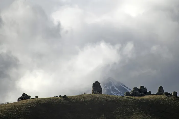 Framed Print : Cloud formations waft over the rocky landscape at Castle Hill