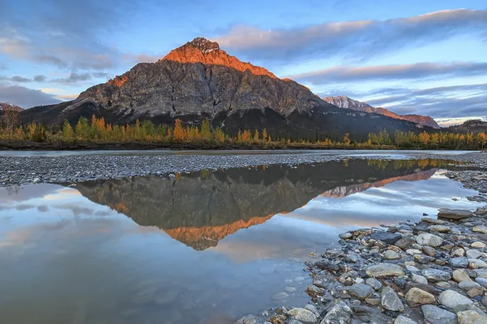 Framed Print : Clouds and evening light over mountains
