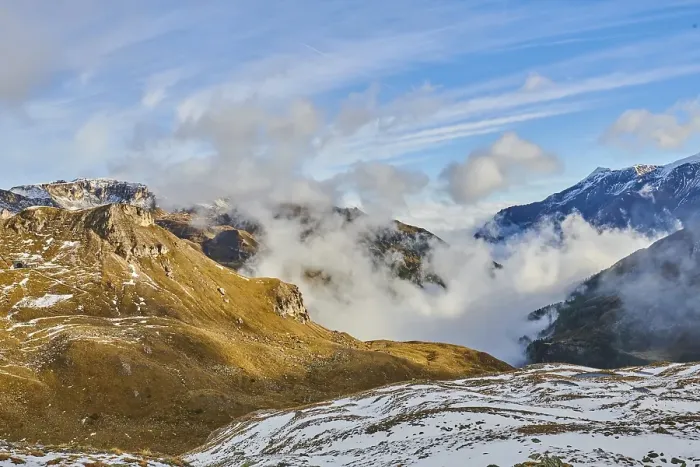 Framed Print : Clouds lying in the valley between Mountains at Hochalpenstrasse Framed Print : Clouds lying in the valley between Mountains at Hochalpenstrasse