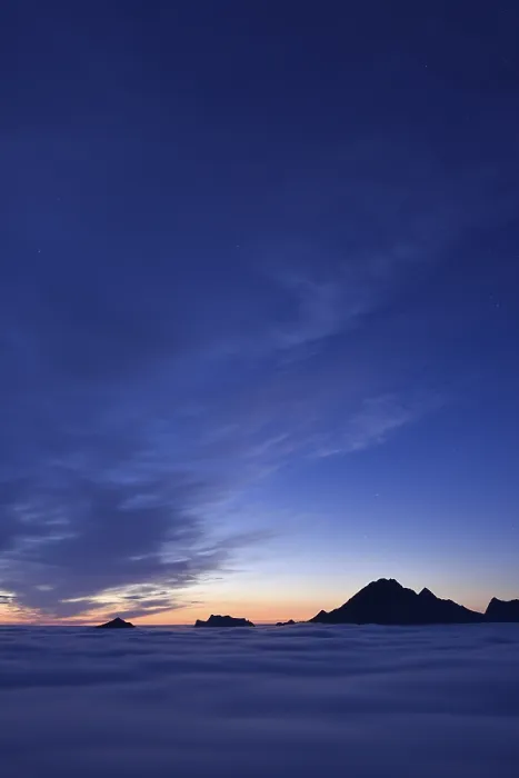 Framed Print : Clouds and mountain peaks, view from Offersoykammen at dusk