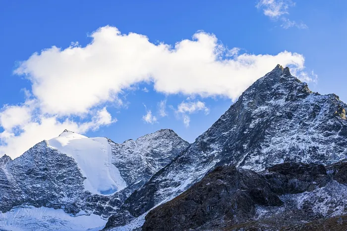 Framed Print : Clouds over the peaks of the Grand Cornier mountains