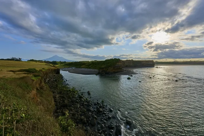 Framed Print : Coastal landscape with sea, cliffs and cloudy sky Framed Print : Coastal landscape with sea, cliffs and cloudy sky