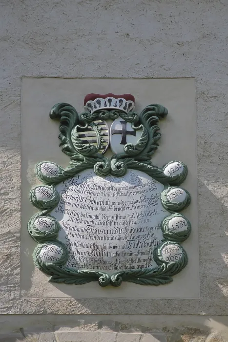 Framed Print : Coat of arms with text at the entrance to the castle and museum
