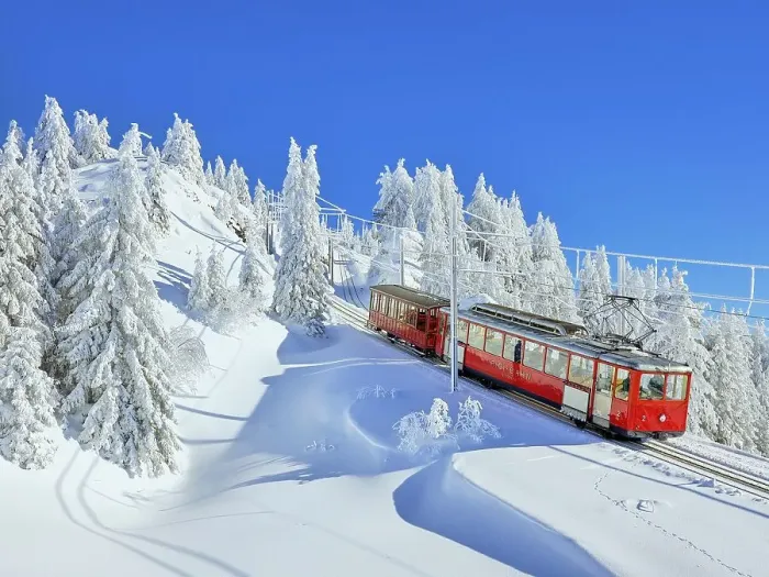 Framed Print : Cogwheel railway travelling through snow-covered forest Framed Print : Cogwheel railway travelling through snow-covered forest