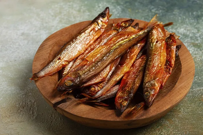 Framed Print : Cold smoked capelin, on a wooden bowl