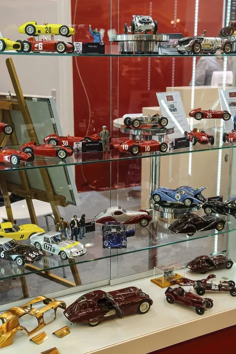 Framed Print : Collector's showcase with models of historic sports cars racing cars