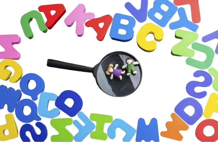Framed Print : Colored wooden letters of the English alphabet on a white background