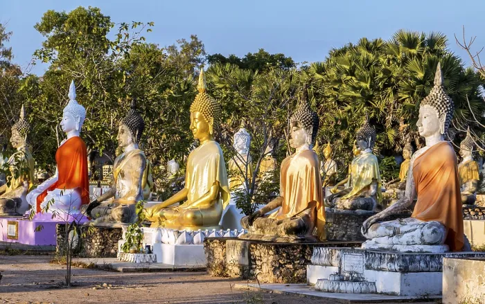Framed Print : A colorful group of Buddha statues at the Buddhist Cemetery