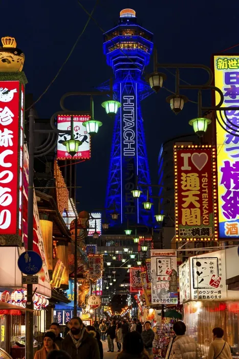 Framed Print : Many colorful neon signs in a pedestrian zone with shops and restaurants