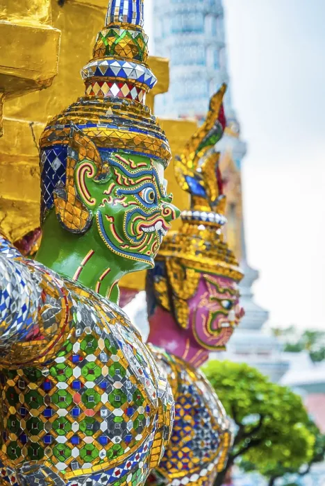 Framed Print : Colorful statue against colorful pagoda at Wat Phra Kaew temple Framed Print : Colorful statue against colorful pagoda at Wat Phra Kaew temple