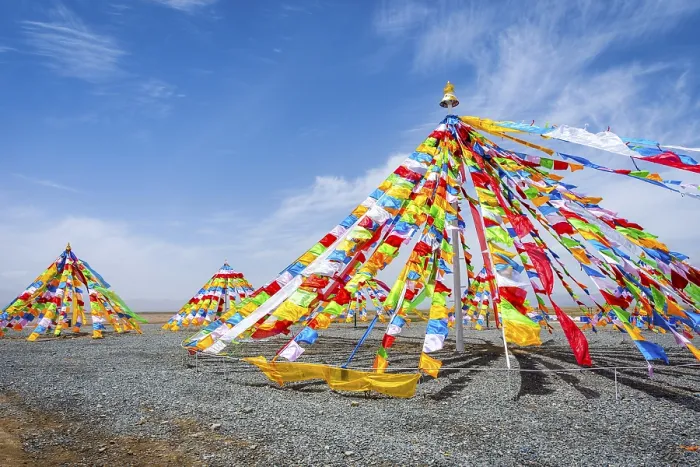 Framed Print : Colorful tibetan buddhist praying flags in the wind next to Chaqia salt lake
