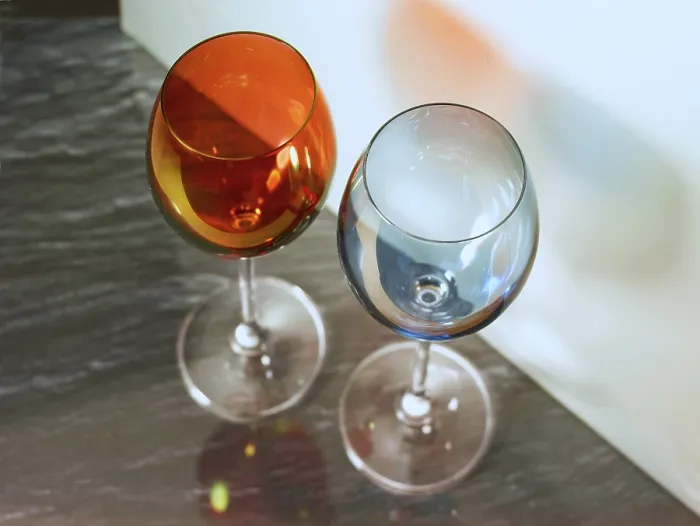 Framed Print : Two coloured wine glasses, studio shot Framed Print : Two coloured wine glasses, studio shot