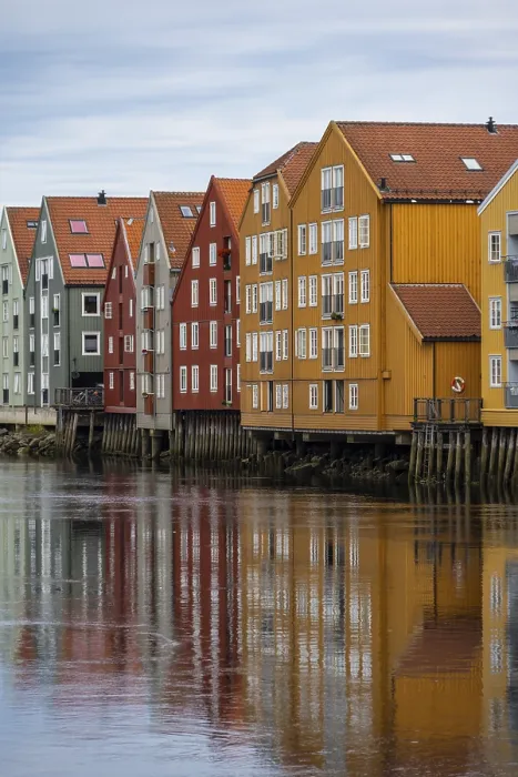 Framed Print : Colourful historic warehouses by the river Nidelva Framed Print : Colourful historic warehouses by the river Nidelva