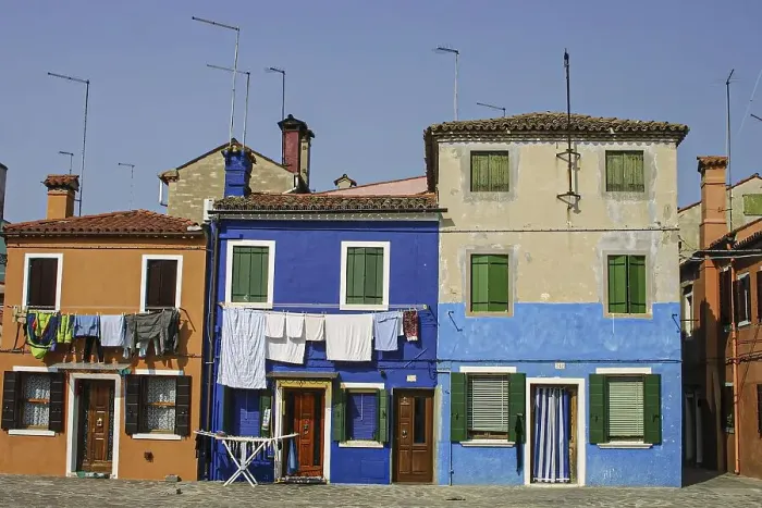 Framed Print : Colourful houses with clotheslines Framed Print : Colourful houses with clotheslines