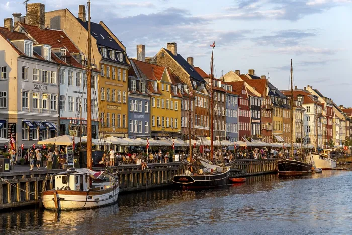 Framed Print : Colourful houses, restaurants and historic ships on the Nyhavn canal and harbour Framed Print : Colourful houses, restaurants and historic ships on the Nyhavn canal and harbour